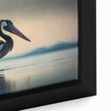 Framed canvas wall art featuring a close-up of a colorful pelican design, showcasing vibrant hues of blue, orange, and yellow, perfect for coastal-inspired decor.