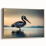 Framed canvas wall art featuring a side view of a pelican design, set against a gold background, ideal for coastal decor enthusiasts. Perfect for adding elegance to any living space.