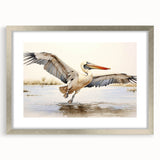 Framed wall art collection showcasing a silver mat and a striking pelican design. Ideal for coastal decor, enhancing living spaces with elegance and nature-inspired charm.