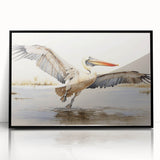 Framed wall art featuring a modern pelican design, displayed in a sleek black frame with an acrylic front, perfect for coastal-themed home decor.