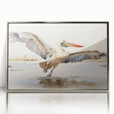 Framed acrylic wall art featuring a pelican design with a silver finish, showcasing vibrant colors and intricate details, perfect for coastal-themed decor.