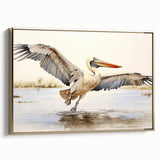 Framed canvas wall art featuring a side view of a pelican design in elegant gold tones, perfect for enhancing coastal-themed decor. Ideal for bird lovers and art enthusiasts.