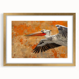 Elegant wall art featuring a pelican design in a gold frame, showcasing intricate details and a white mat, perfect for enhancing home decor.