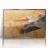 Framed acrylic wall art featuring a detailed pelican design in silver tones, showcasing elegant bird imagery suitable for modern home decor, with a clear front view.