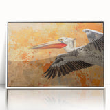 Framed wall art featuring a pelican design, showcasing vibrant colors and intricate details, set against a white background, perfect for coastal-themed decor.