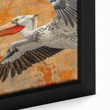 Close-up view of a framed canvas wall art showcasing a vibrant pelican design in a tropical setting, ideal for beach-themed decor and bird lovers. This artwork features rich colors and intricate details, enhancing any room's aesthetic.