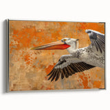 Framed wall art featuring a silver-bordered canvas depicting a side view of a pelican in a serene setting, perfect for coastal-themed decor.