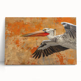 Stretched canvas wall art featuring a vibrant pelican design in soft blues and earthy tones, perfect for coastal home decor and adding elegance to any room.
