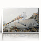 Framed wall art featuring a serene pelican design, crafted with acrylic material and a sleek white frame, ideal for coastal decor enthusiasts.