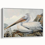 Framed wall art featuring a side view of a pelican design on canvas, highlighting intricate details and a white frame, perfect for coastal home decor.