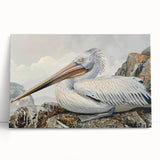 Colorful stretched canvas wall art featuring a pelican design, leaning against a white wall, perfect for coastal-themed home decor or bird lovers.