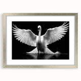 Elegant wall art showcasing a silver-framed swan design, featuring intricate details and a soft mat, perfect for enhancing modern home decor. Ideal for bird and nature enthusiasts.