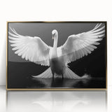 Framed wall art showcasing a stylish gold-accented design of swans, ideal for modern decor. The acrylic frame enhances the elegance, making it perfect for any living space.