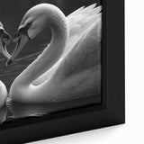 Close-up of a framed wall art collection showcasing elegant swan designs in soft pastel colors, enhancing home decor with a serene and artistic touch.