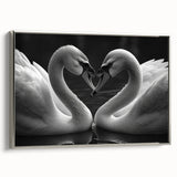 Framed canvas wall art collection featuring a serene swan design in silver tones, showcased from a side view, perfect for adding elegance to any room decor.