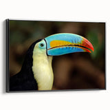 Framed canvas wall art showcasing a vibrant tropical bird design with a black frame, ideal for enhancing home decor with a touch of nature's beauty.