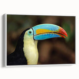 Framed canvas wall art showcasing a vibrant tropical birds design with a white frame, perfect for adding color and nature-inspired decor to any room.