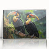 Framed wall art featuring a vibrant tropical bird design with lush greenery, showcased in a sleek white frame, perfect for brightening home decor.