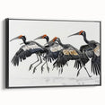 Framed canvas wall art featuring a vibrant tropical bird design, showcasing colorful parrots and exotic foliage, presented in a sleek black frame for stylish decor.