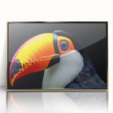 Framed wall art showcasing a vibrant tropical bird design with gold accents, perfect for home decor. The artwork features a detailed illustration of exotic birds against a lush backdrop, enhancing any interior space with a touch of nature and elegance.