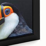 Close-up of a framed canvas featuring vibrant tropical birds on a colorful background, showcasing intricate details and lively hues, perfect for nature-inspired decor.