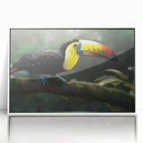 Framed wall art showcasing a vibrant tropical bird design, featuring lush colors and intricate details, presented in a sleek white frame, perfect for home decor.