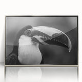 Framed acrylic wall art showcasing a vibrant tropical bird design in silver, perfect for adding a touch of nature-inspired elegance to any modern decor.