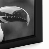 Close-up of a vibrant tropical birds wall art design featuring colorful avian illustrations, framed in an elegant black frame, perfect for enhancing living spaces.