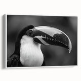 Framed wall art showcasing a vibrant tropical bird design on canvas, featuring bright colors and intricate details, perfect for enhancing any living space.