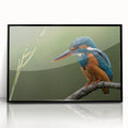 Framed wall art featuring a vibrant tropical bird design with lush foliage, set in a sleek black frame, perfect for enhancing modern decor.