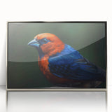 Framed wall art featuring a vibrant tropical bird design, showcasing intricate colors and details, set in a sleek silver frame, perfect for home decor.