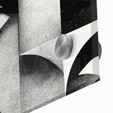 Close-up view of a black and white abstract wall art design, showcasing intricate patterns and textures on acrylic glass, ideal for modern decor.