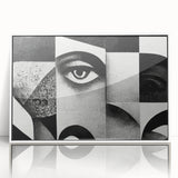 Framed black and white abstract wall art showcasing a modern design with fluid shapes and lines, set against a white background for contrast.