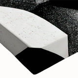 Close-up of a black and white abstract design on stretched canvas wall art, showcasing intricate patterns and textures ideal for modern decor.