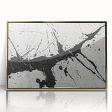 Framed black and white abstract wall art design showcasing dynamic shapes and textures, accented with a sleek gold frame, perfect for modern decor.