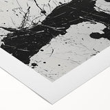 Abstract black and white wall art design on rolled canvas, showcasing dynamic shapes and patterns, perfect for modern decor.