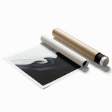 Abstract black and white wall art print showcasing dynamic shapes and lines, ideal for modern home decor or artistic gallery settings.