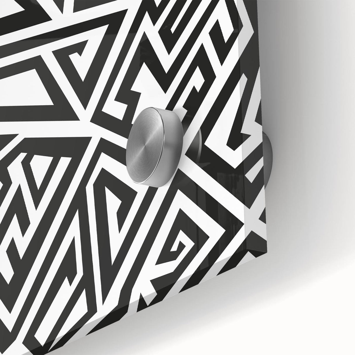 Close-up of a black and white abstract wall art design featuring fluid shapes and textures, perfect for modern home decor and artistic expression.