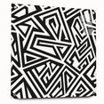 Abstract black and white wall art design displayed in a stylish acrylic glass frame, showcasing modern aesthetics and sleek pins for mounting.
