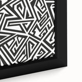 Close-up of a framed black and white abstract wall art piece, showcasing intricate patterns and textures, perfect for modern home decor.