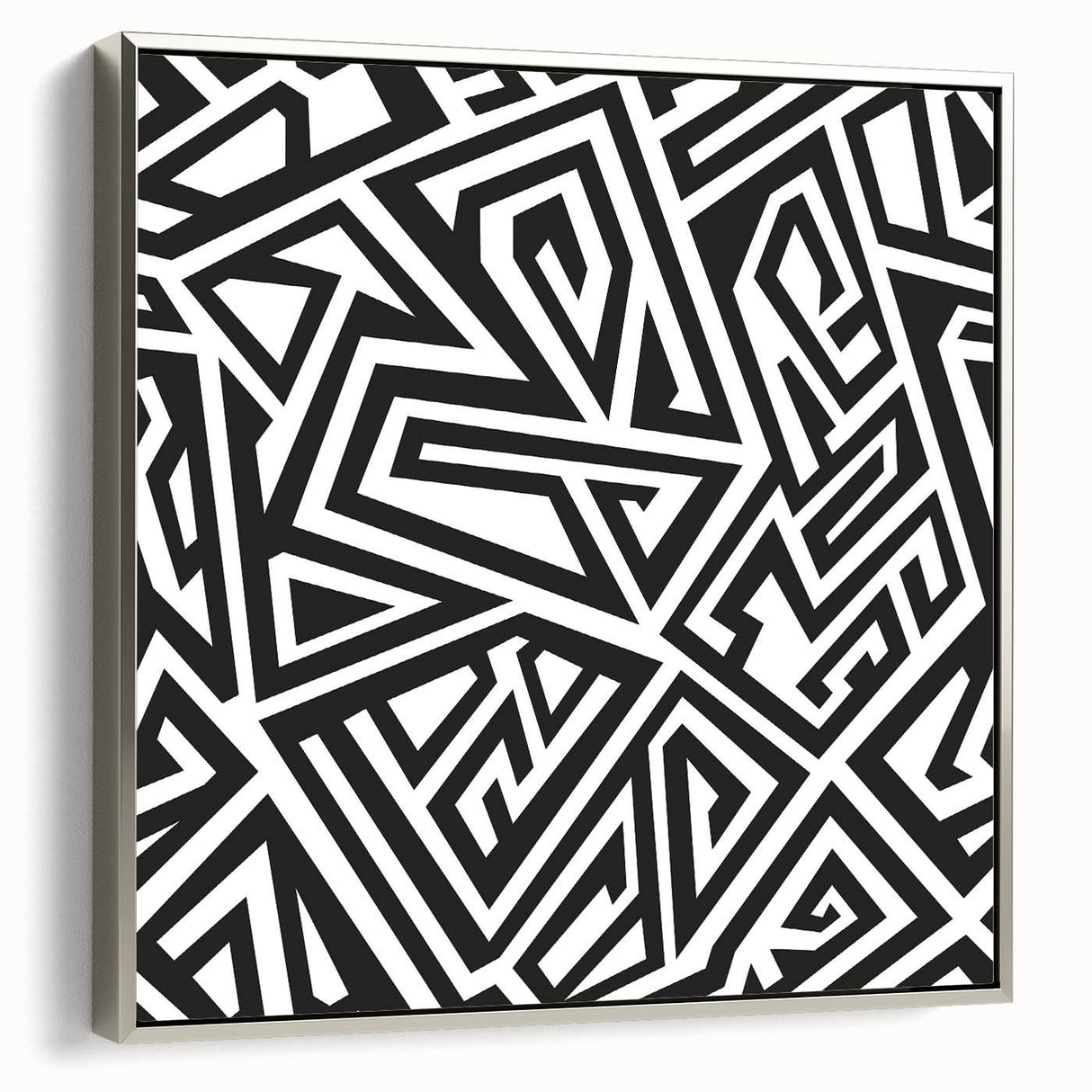 Framed black and white abstract wall art featuring a modern design with fluid shapes and textures, set against a silver frame.