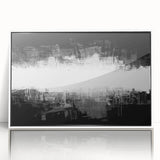 Framed black and white abstract wall art featuring dynamic shapes and lines, elegantly displayed in a sleek white frame, perfect for modern decor.