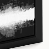 Close-up of a framed black and white abstract wall art piece, showcasing intricate geometric patterns and textures, perfect for modern decor.
