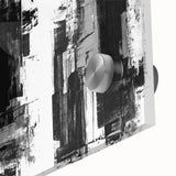 Close-up of a striking black and white abstract wall art design, showcasing fluid shapes and contrasting textures on acrylic glass for modern decor.