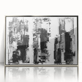 Framed black and white abstract wall art featuring a modern design with intricate patterns, displayed in a sleek silver frame.