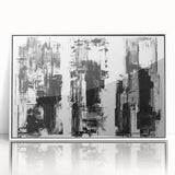 Framed black and white abstract wall art design showcasing dynamic shapes and lines, displayed with a sleek white frame for modern decor.