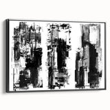 Framed black and white abstract canvas art with a modern design, showcasing intricate patterns and a sleek black frame, ideal for contemporary decor.