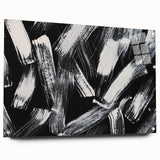 Abstract black-and-white acrylic glass wall art collection displayed from a side view, featuring sharp geometric shapes and modern design elements.