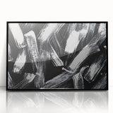 Framed black and white abstract wall art design showcasing bold geometric shapes and fluid lines, perfect for modern decor.