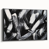 Framed black and white abstract wall art design featuring geometric patterns and textured canvas, showcased from a side view to highlight depth.